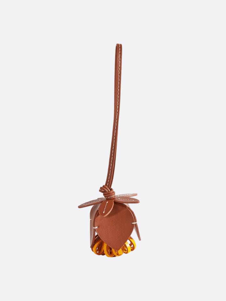 bijou de sac fleur marron